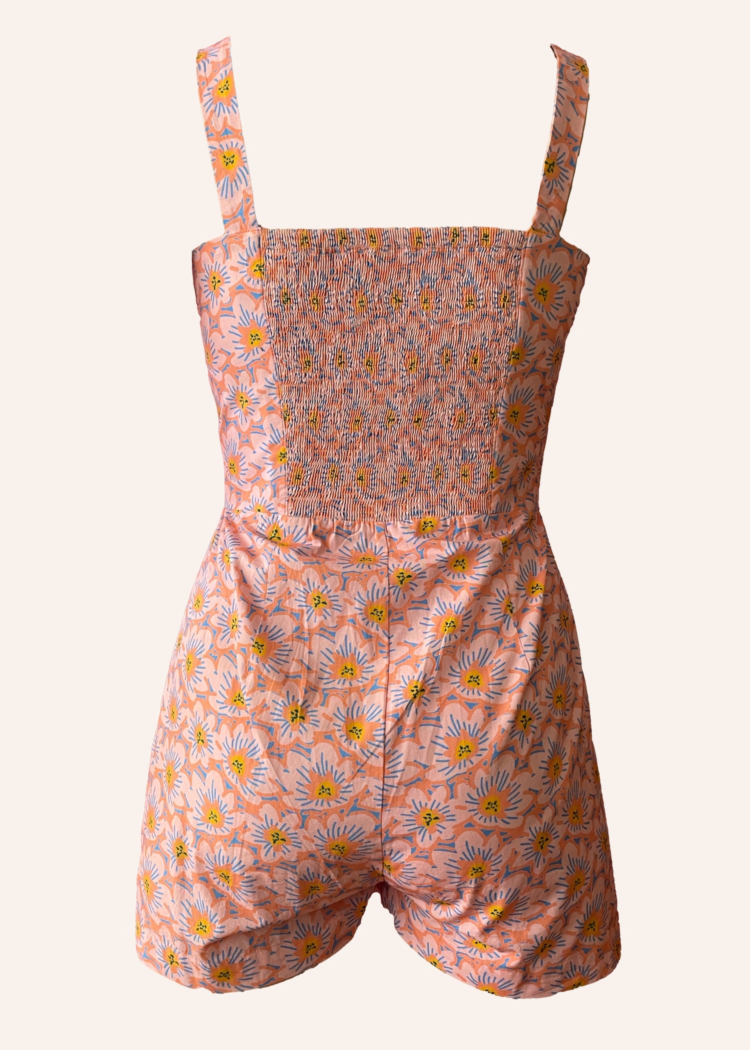 pink patterned retro style vintage playsuit, swimsuit, beach suit with shirred back and button up front