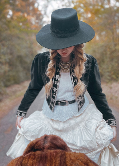 Black cotton velvet cropped jacket bolero with silver leather appliqué detail. Vintage, bohemian inspired. Western Cowgirl. The Outlaw Dame
