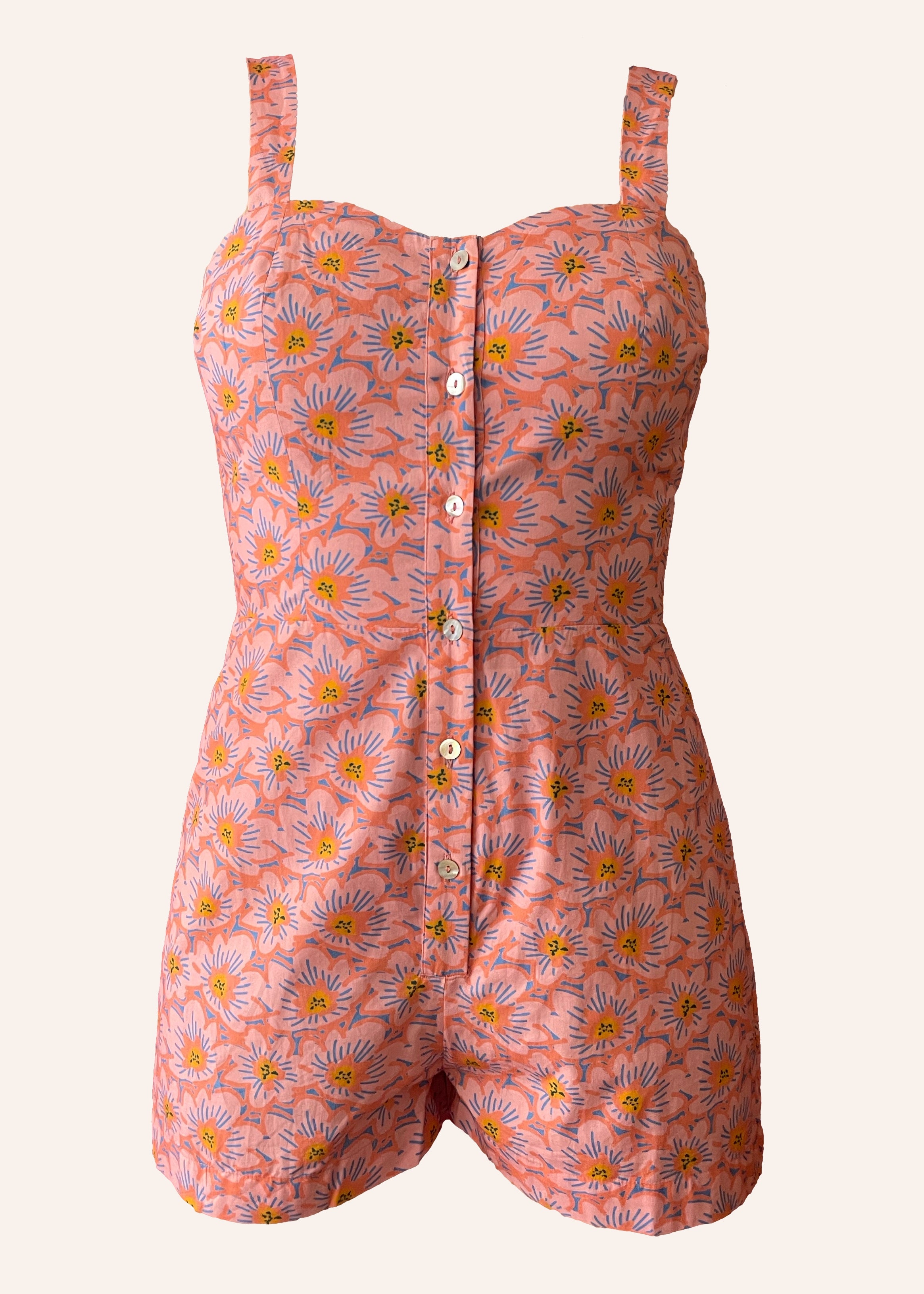 pink patterned retro style vintage playsuit, swimsuit, beach suit with shirred back and button up front