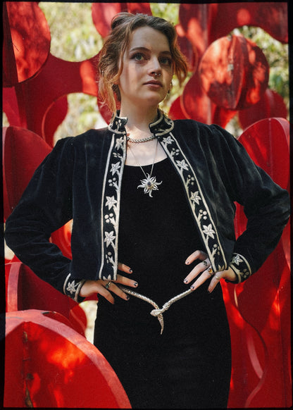 Black cotton velvet cropped jacket with silver leather appliqué detail. Vintage, bohemian inspired. The Outlaw Dame